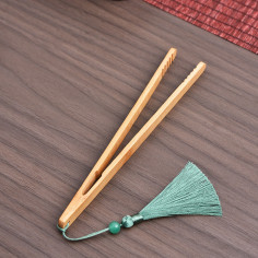 Щипці бамбукові з китицею