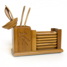 Набір інструментів з підставками для чайної пари.