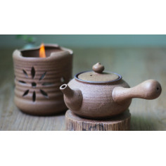 Бежевий керамічний чайник з ажурним різьбленням для варіння пуера 2