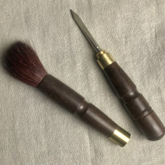 Пензлик і шило для обробки пуерів з чорного дерева